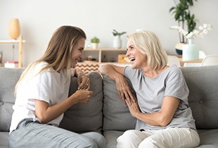 Ladies converse on couch